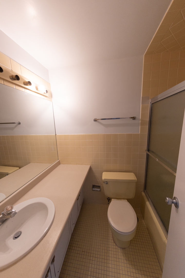 Undisclosed Address Chicago, IL 60645 - Photo 18 of 20 a bathroom with a sink and a toilet