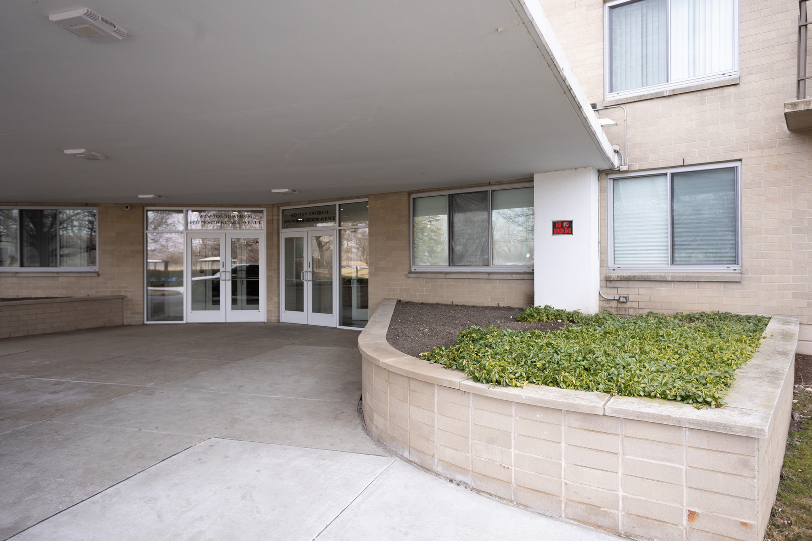 Undisclosed Address Chicago, IL 60645 - Photo 2 of 20 front view of a house with a yard