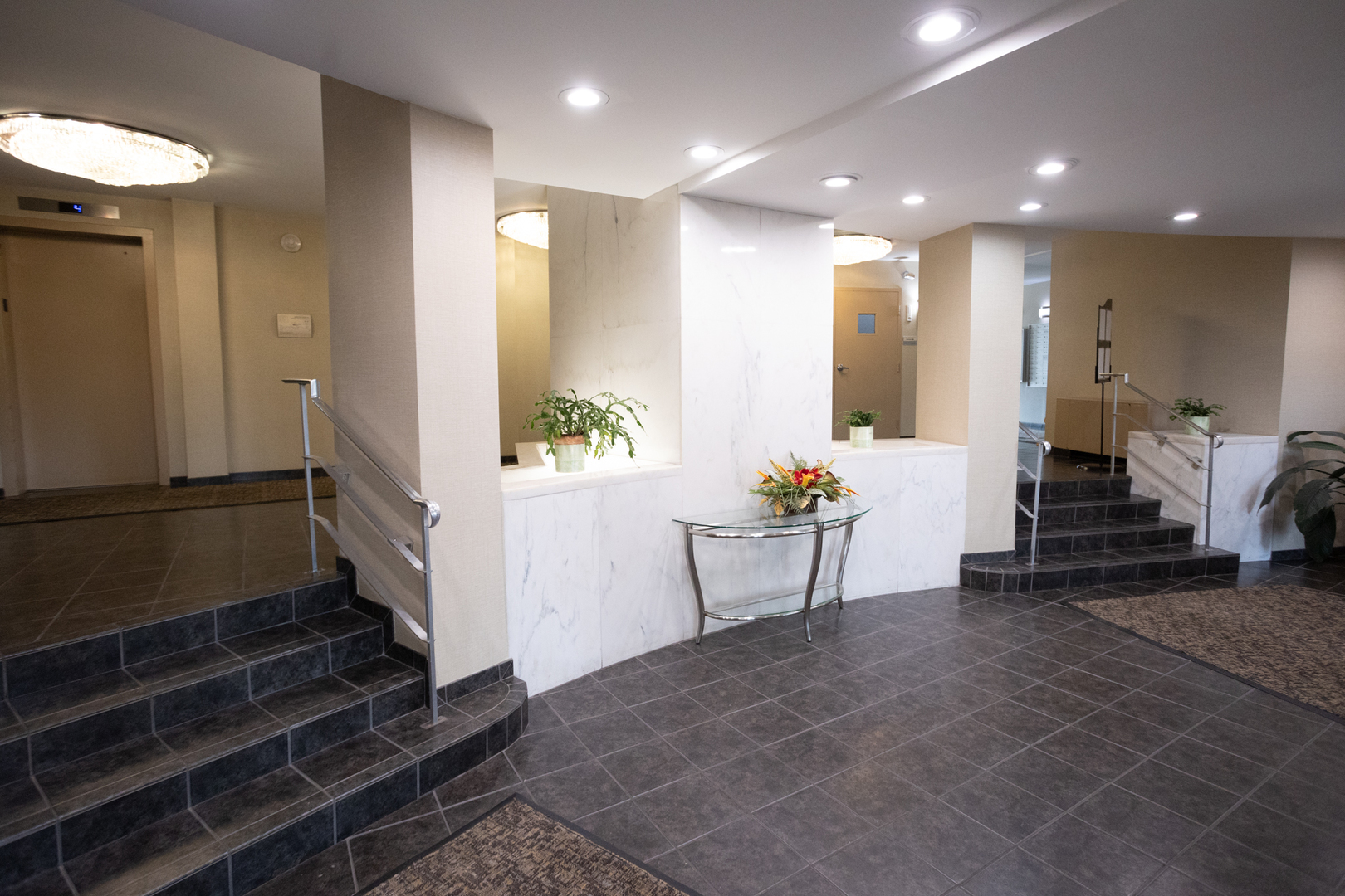 Undisclosed Address Chicago, IL 60645 - Photo 3 of 20 a bathroom with a sink and a mirror