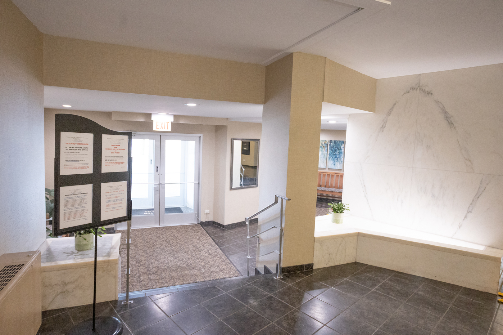 Undisclosed Address Chicago, IL 60645 - Photo 4 of 20 a view of an empty room with wooden floor and a window