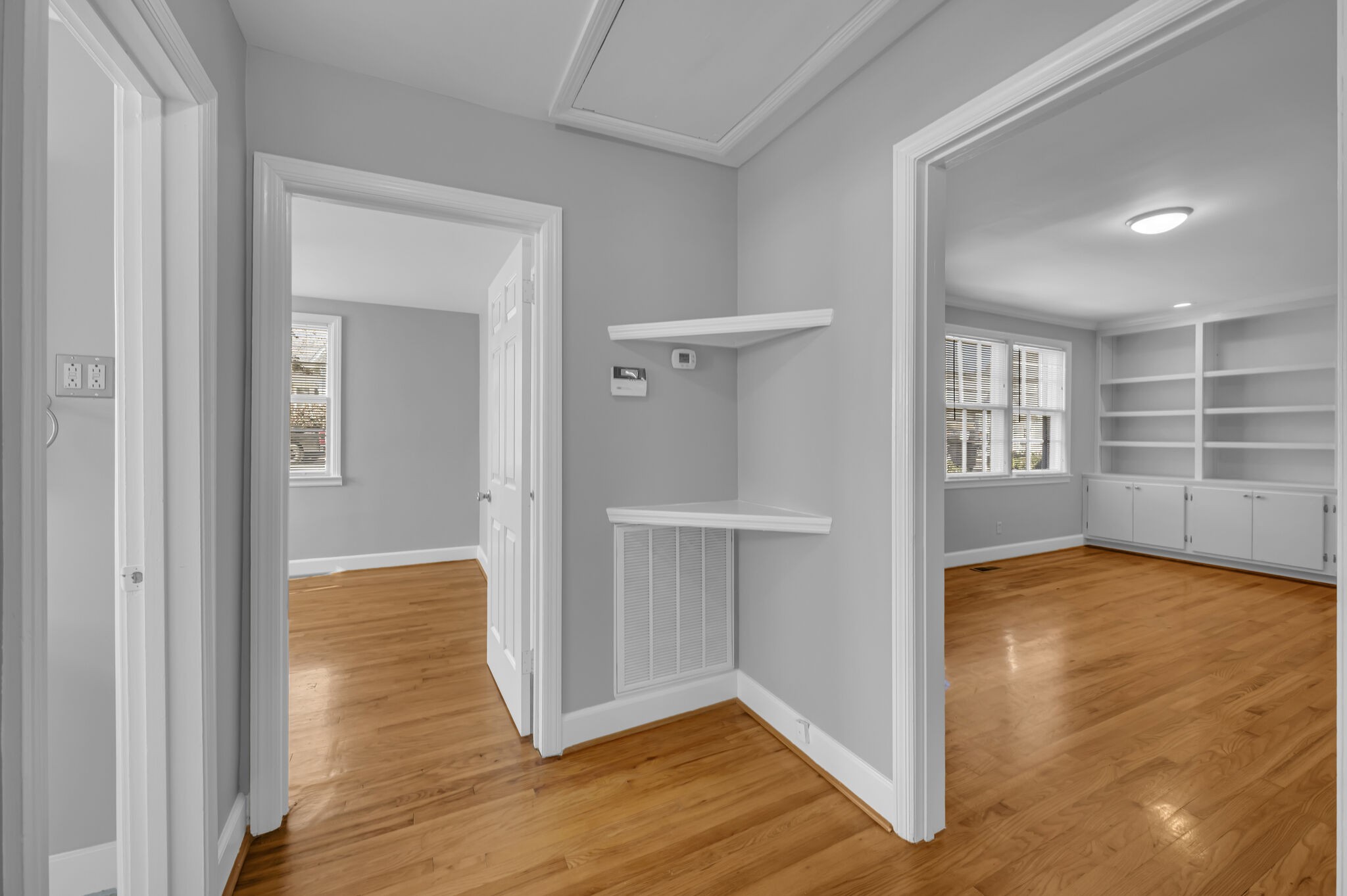 1231 Adams Street Franklin, TN 37064 - Photo 16 of 27 a view of an empty room with wooden floor and a window
