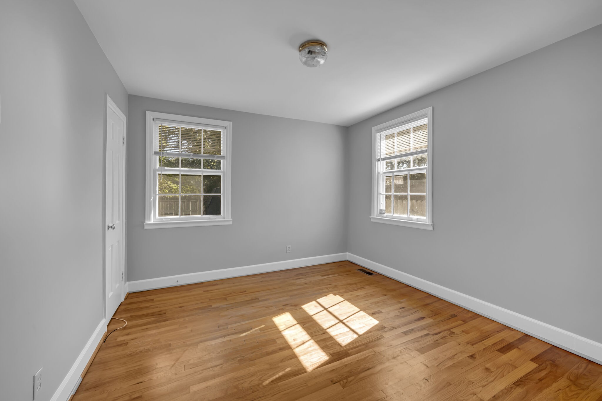 1231 Adams Street Franklin, TN 37064 - Photo 20 of 27 a view of empty room with wooden floor and fan