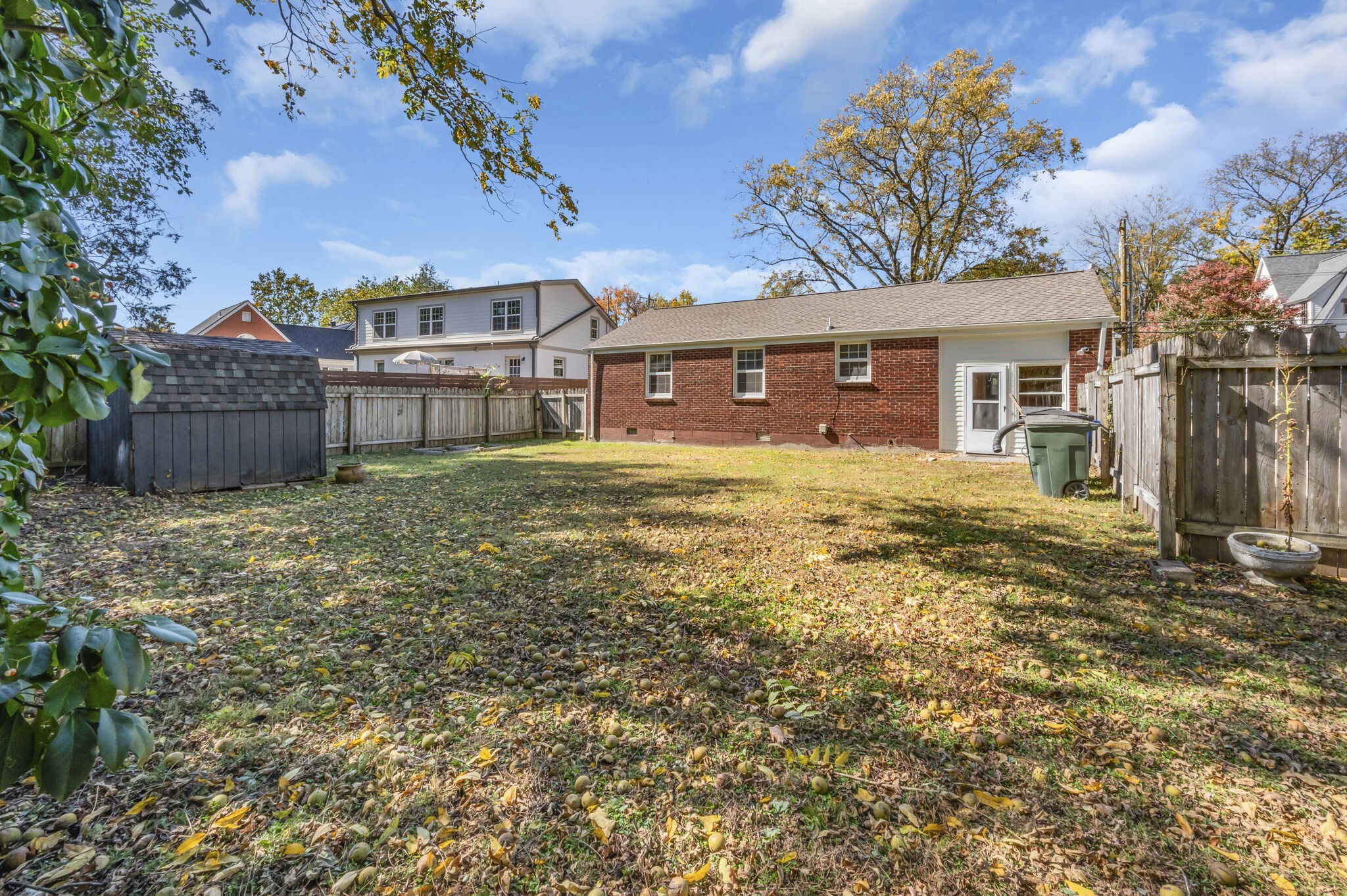 1231 Adams Street Franklin, TN 37064 - Photo 26 of 27 a view of a house with a yard and fence