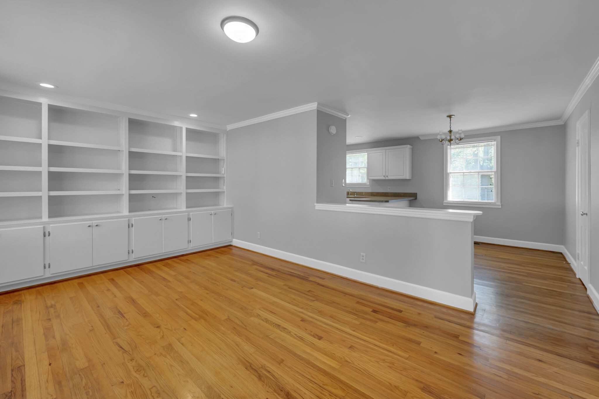 1231 Adams Street Franklin, TN 37064 - Photo 4 of 27 wooden floor in an empty room with a window