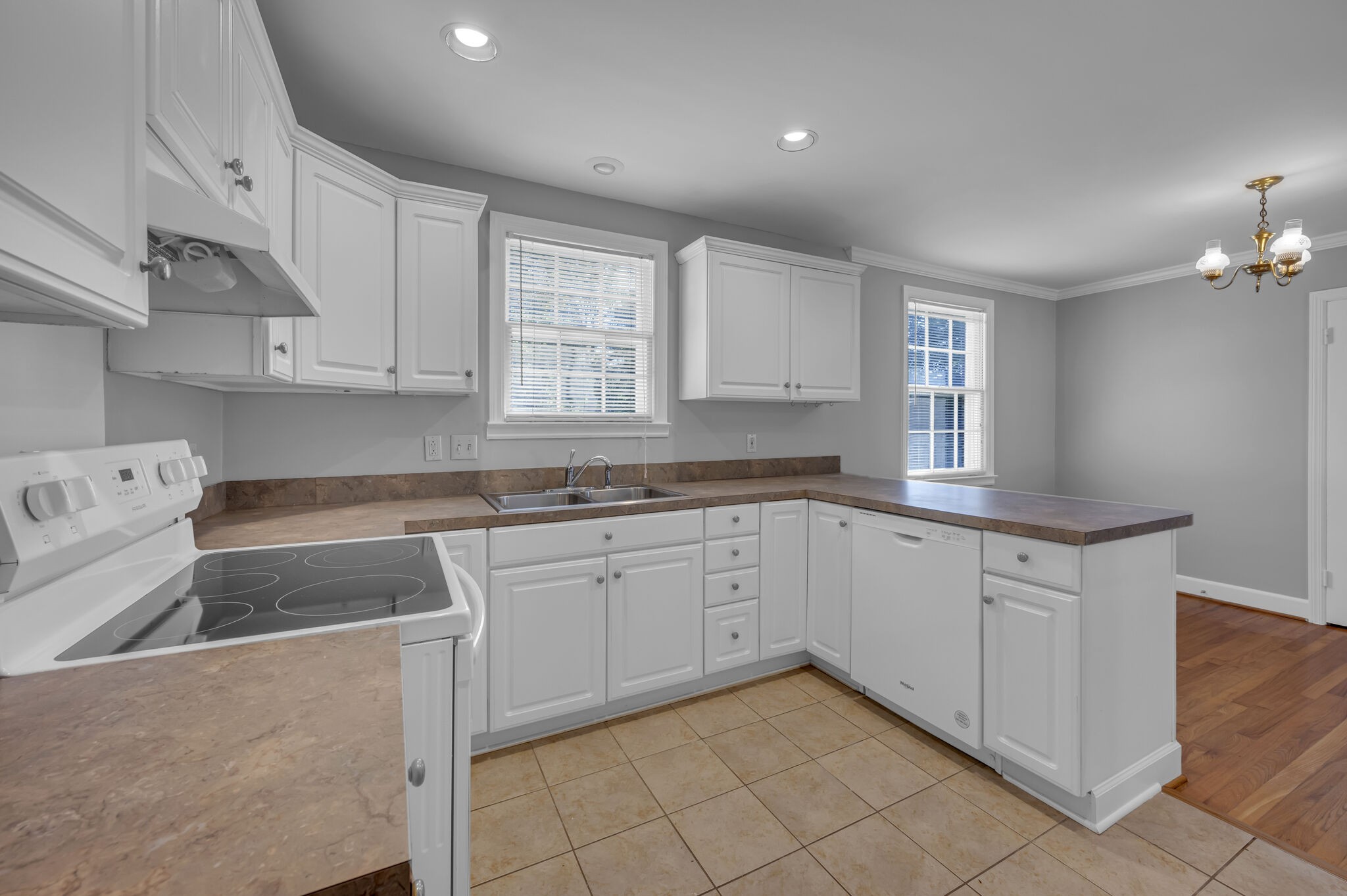 1231 Adams Street Franklin, TN 37064 - Photo 9 of 27 a kitchen that has a sink and a stove in it