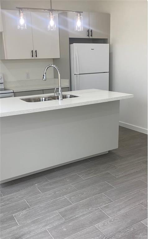 1408 Marcela Drive, Unit 3 Weslaco, TX 78599 - Photo 3 of 10 a close view of two sink