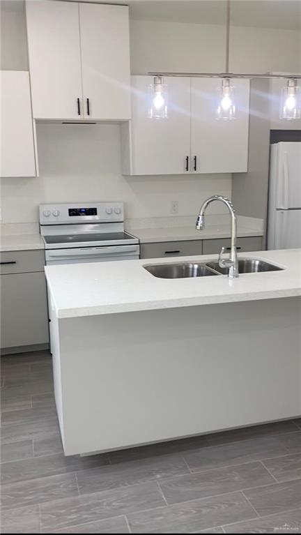 1408 Marcela Drive, Unit 3 Weslaco, TX 78599 - Photo 4 of 10 a close view of sink and cabinets