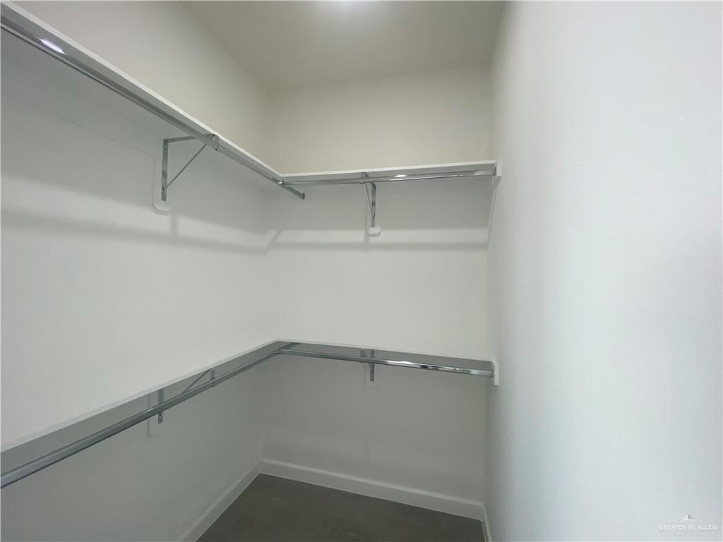 1408 Marcela Drive, Unit 3 Weslaco, TX 78599 - Photo 7 of 10 a view of an empty walk in closet