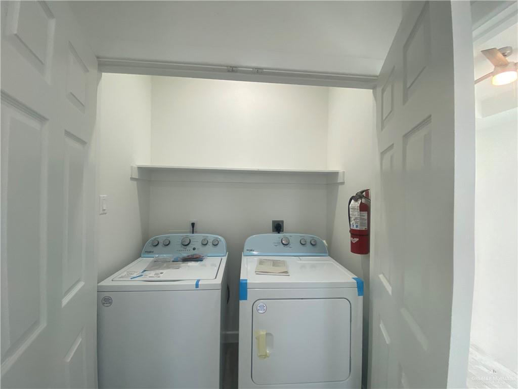 1408 Marcela Drive, Unit 3 Weslaco, TX 78599 - Photo 8 of 10 a utility room with dryer and washer