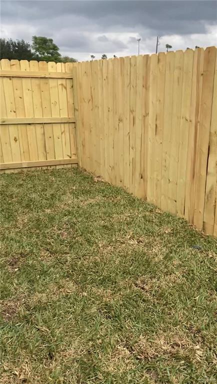 1408 Marcela Drive, Unit 3 Weslaco, TX 78599 - Photo 9 of 10 a view of a room with wooden floor and a window