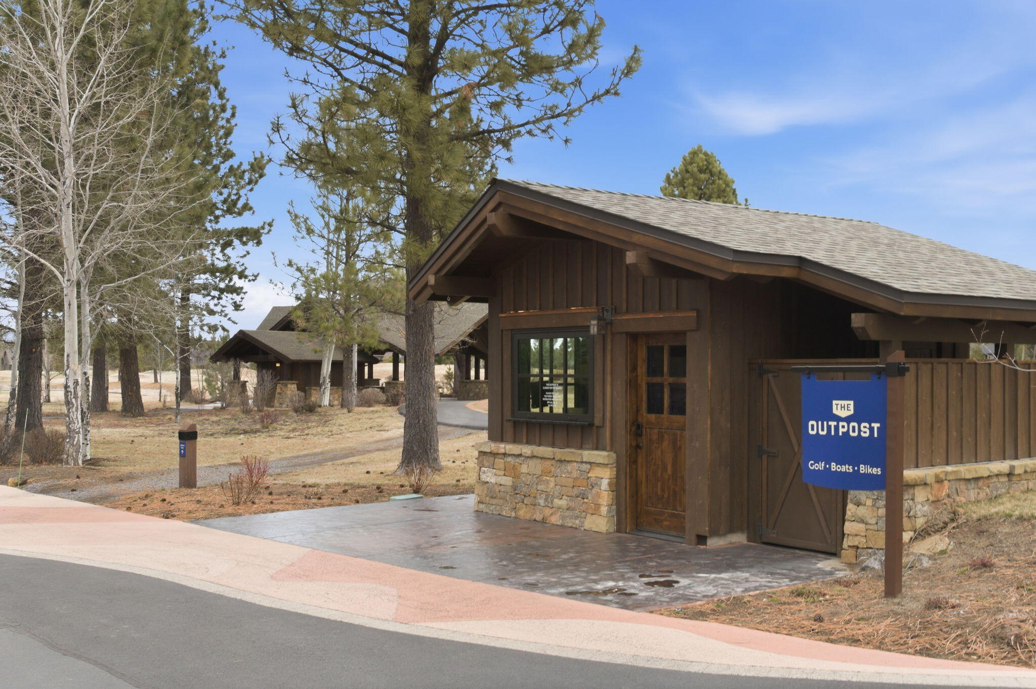 56508 Dancing Rock Loop, Unit 22 Bend, OR 97707 - Photo 62 of 69 a view of a building with a tree