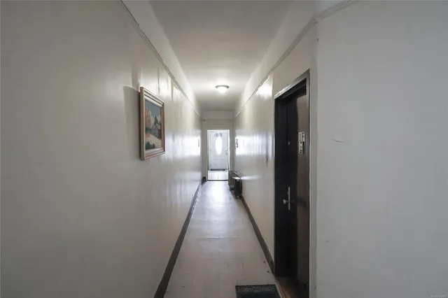 a view of a pathway with a building in the background