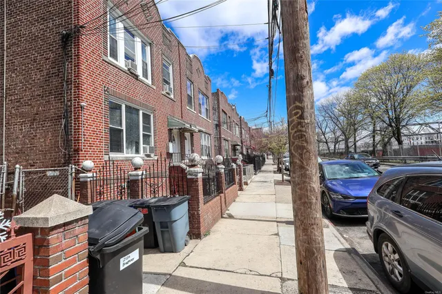a car parked in front of a houses