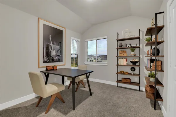 a view of a livingroom with furniture and window