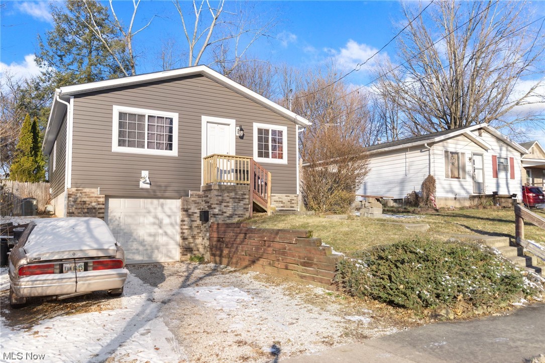 862 Nevin Street Akron, OH 44310 - Photo 2 of 28 View of front facade featuring a garage