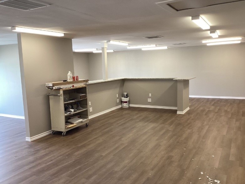 1010 1st Street East Humble, TX 77338 - Photo 13 of 49 a view of a room with wooden floor and window