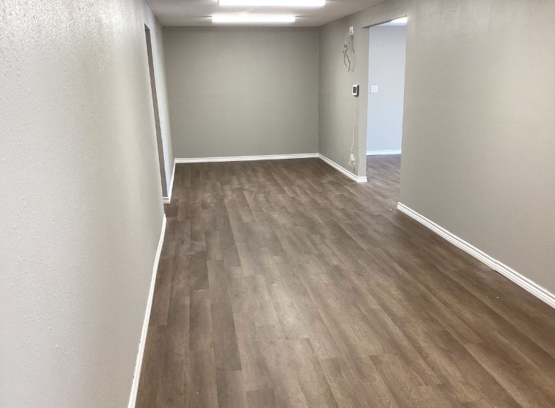 1010 1st Street East Humble, TX 77338 - Photo 42 of 49 an empty room with wooden floor
