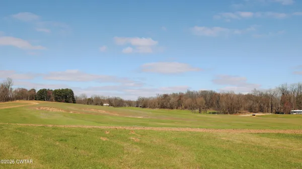 a view of an outdoor space and a yard