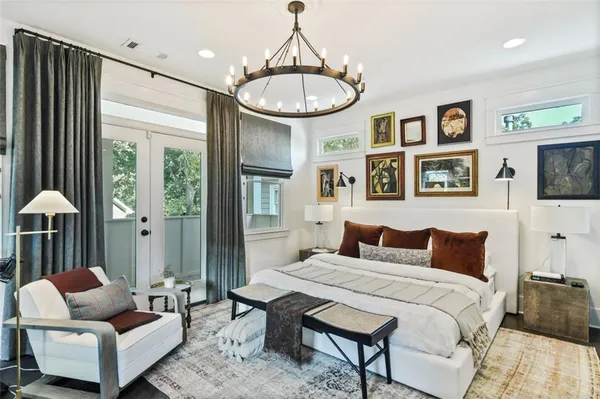 a bathroom with double vanity sinks and a mirror