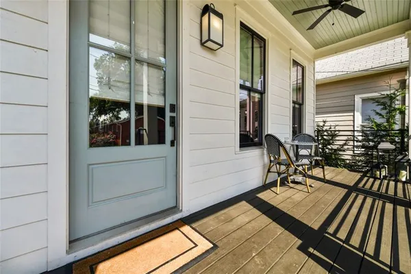 a view of balcony with chairs