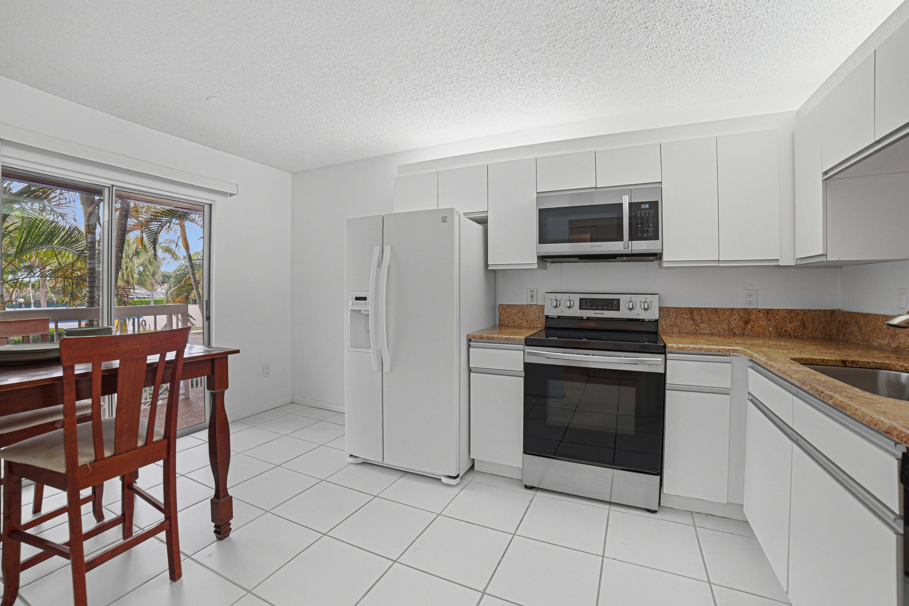260 Northwest 67th Street, Unit A203 Boca Raton, FL 33487 - Photo 7 of 25 Kitchen