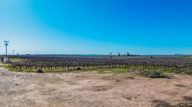 a view of a lake with a house in the background