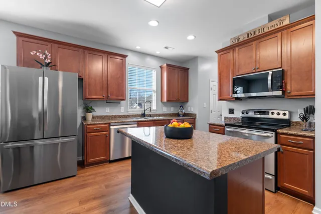 a living room with furniture fireplace and a flat screen tv
