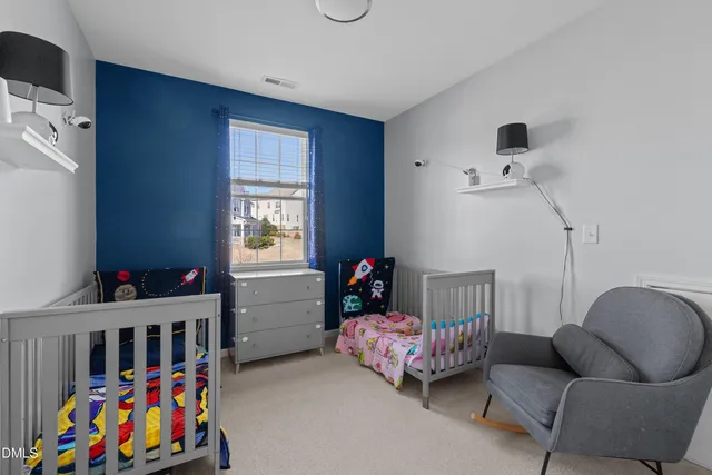 a en suite bathroom with a sink and a mirror