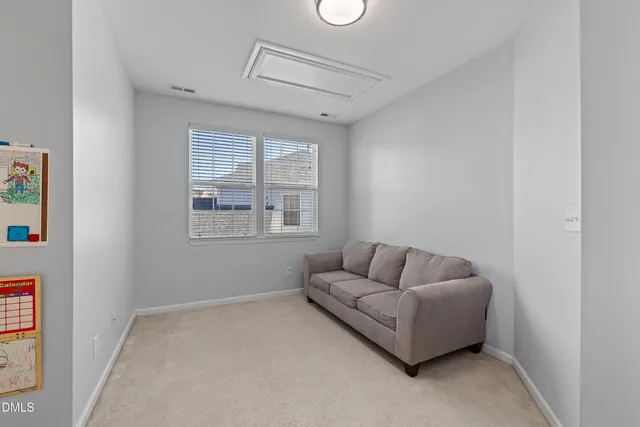 a white bath tub sitting next to a window