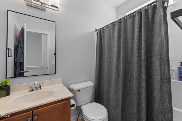 a bedroom with furniture and a couch