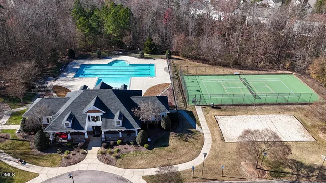 a view of house with outdoor space and seating area