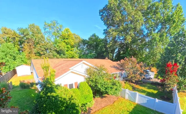 a view of house with outdoor space