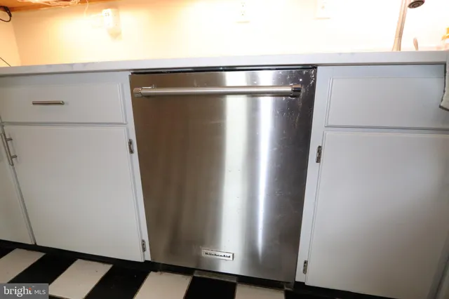 a bathroom with a bathtub and a sink