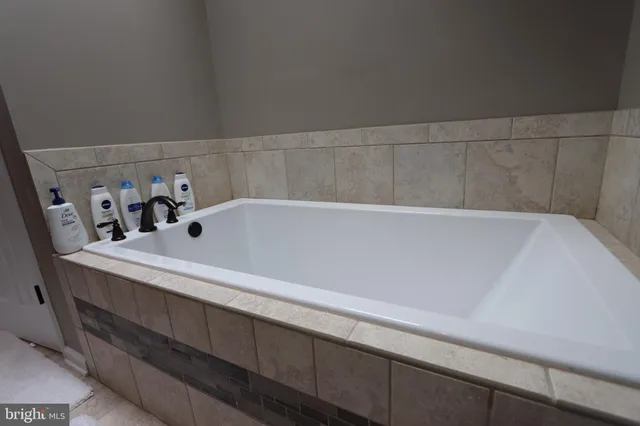 an empty room with wooden floor