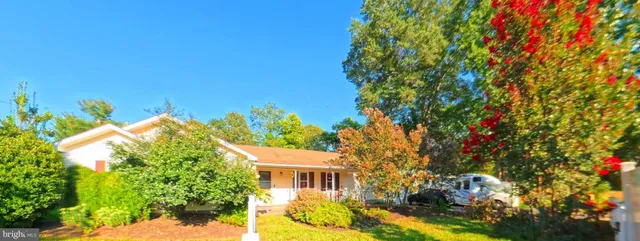 a view of a patio with furniture