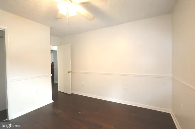 a workspace with furniture and wooden floor