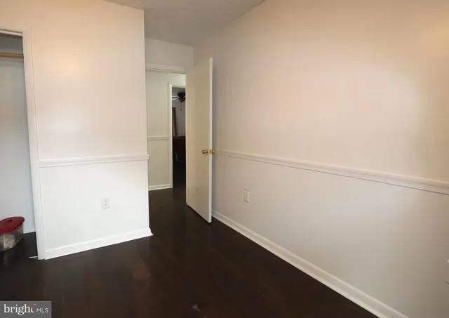 wooden floor in a hall with an entryway