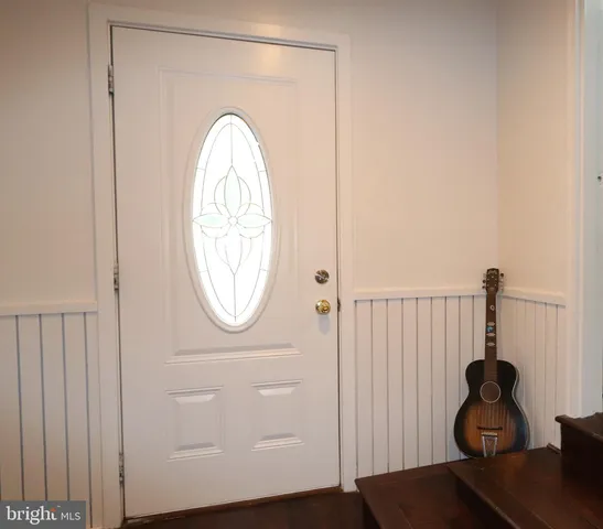 a view of a house with a back yard