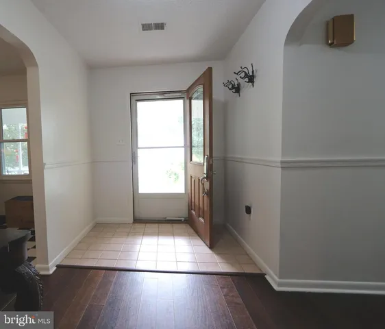 a view of backyard with green space