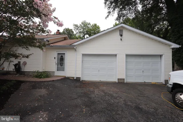 a kitchen with a stove and a microwave