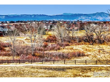 an aerial view of residential building and trees