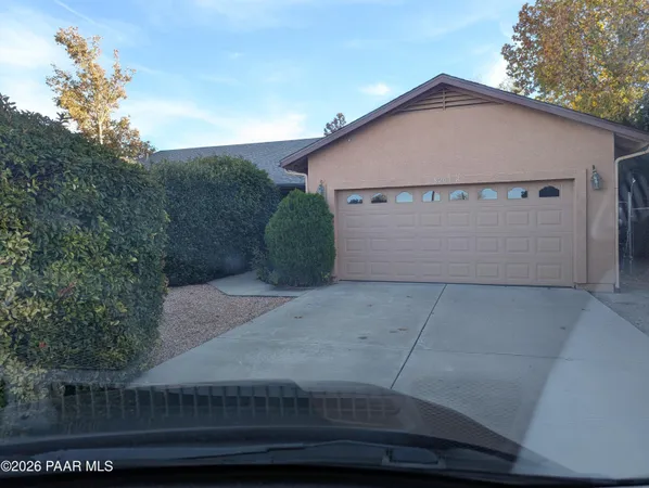 a view of a house with a garage
