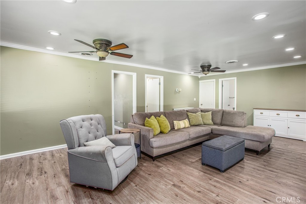 5169 Telefair Way Riverside, CA 92506 - Photo 19 of 47 Another look of the family room with access to the garage and bathroom.