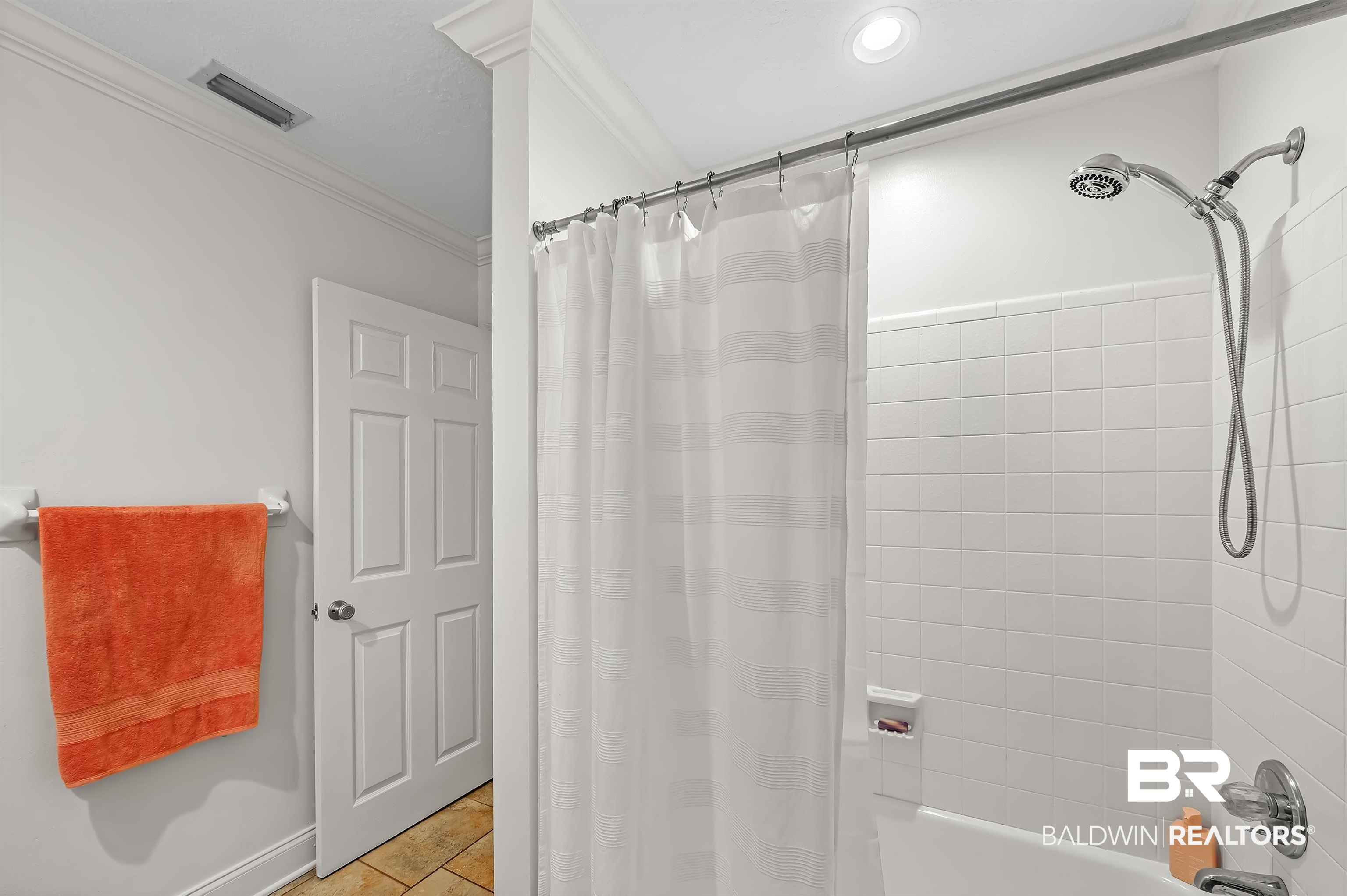 104 James Circle Daphne, AL 36526 - Photo 59 of 62 Bathroom with tile patterned floors, crown molding, and shower / bath combination with curtain