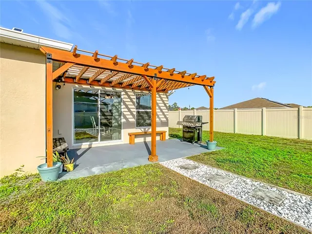 a house view with a garden space