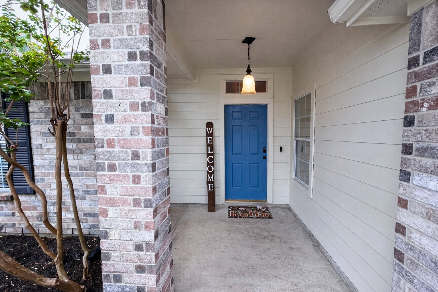 21510 Forest Colony Drive Porter, TX 77365 - Photo 3 of 19 a view of wooden door and brick wall