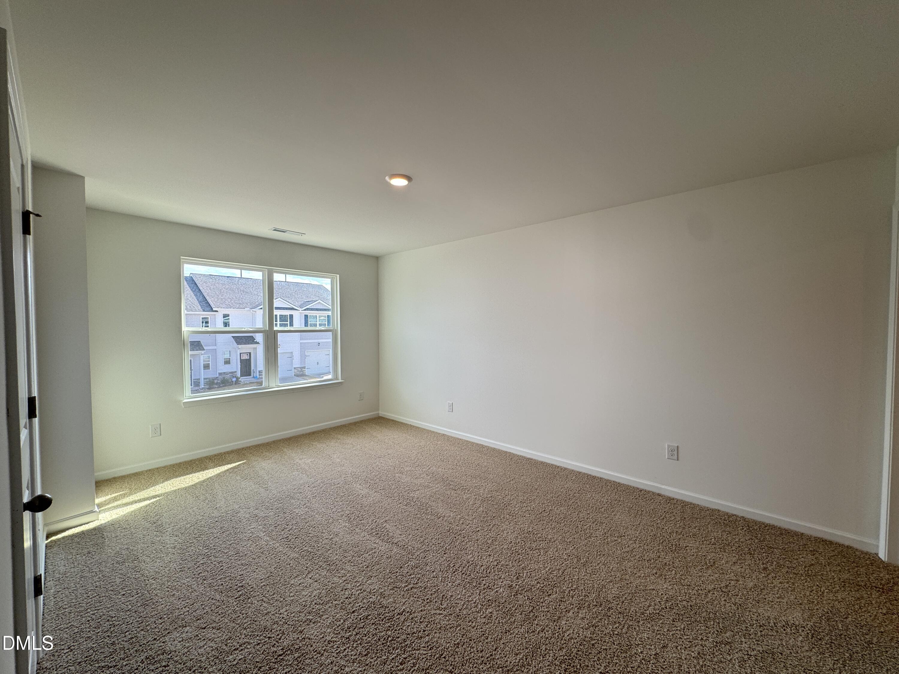 419 Belgian Red Way Wake Forest, NC 27587 - Photo 10 of 18 an empty room with windows