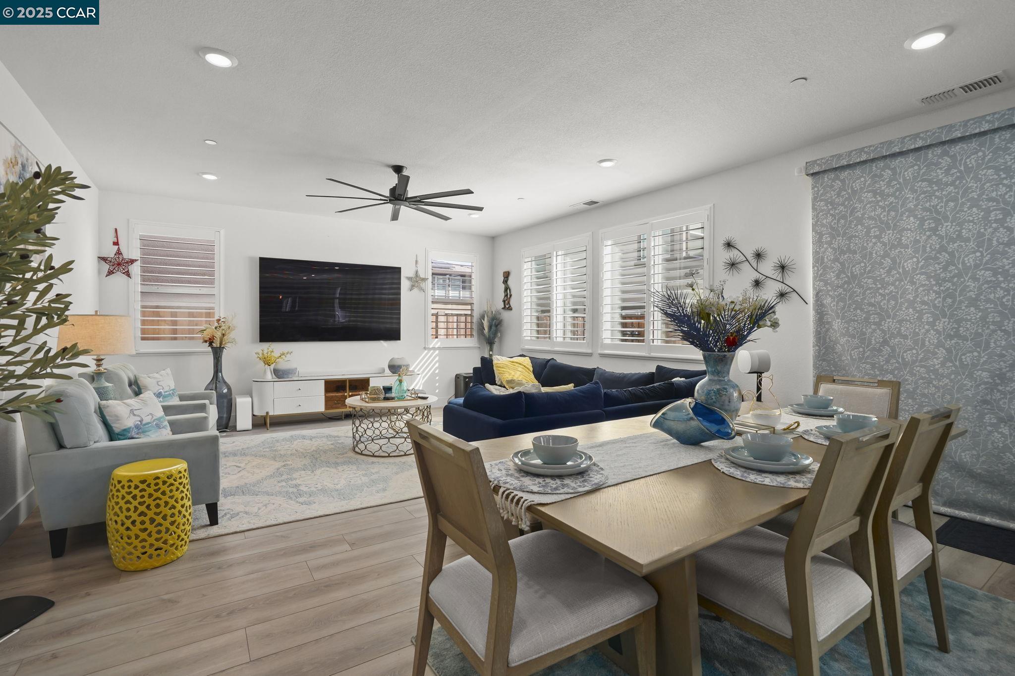 433 Ramos Ranch Road Oakley, CA 94561 - Photo 6 of 25 a living room with furniture and a flat screen tv