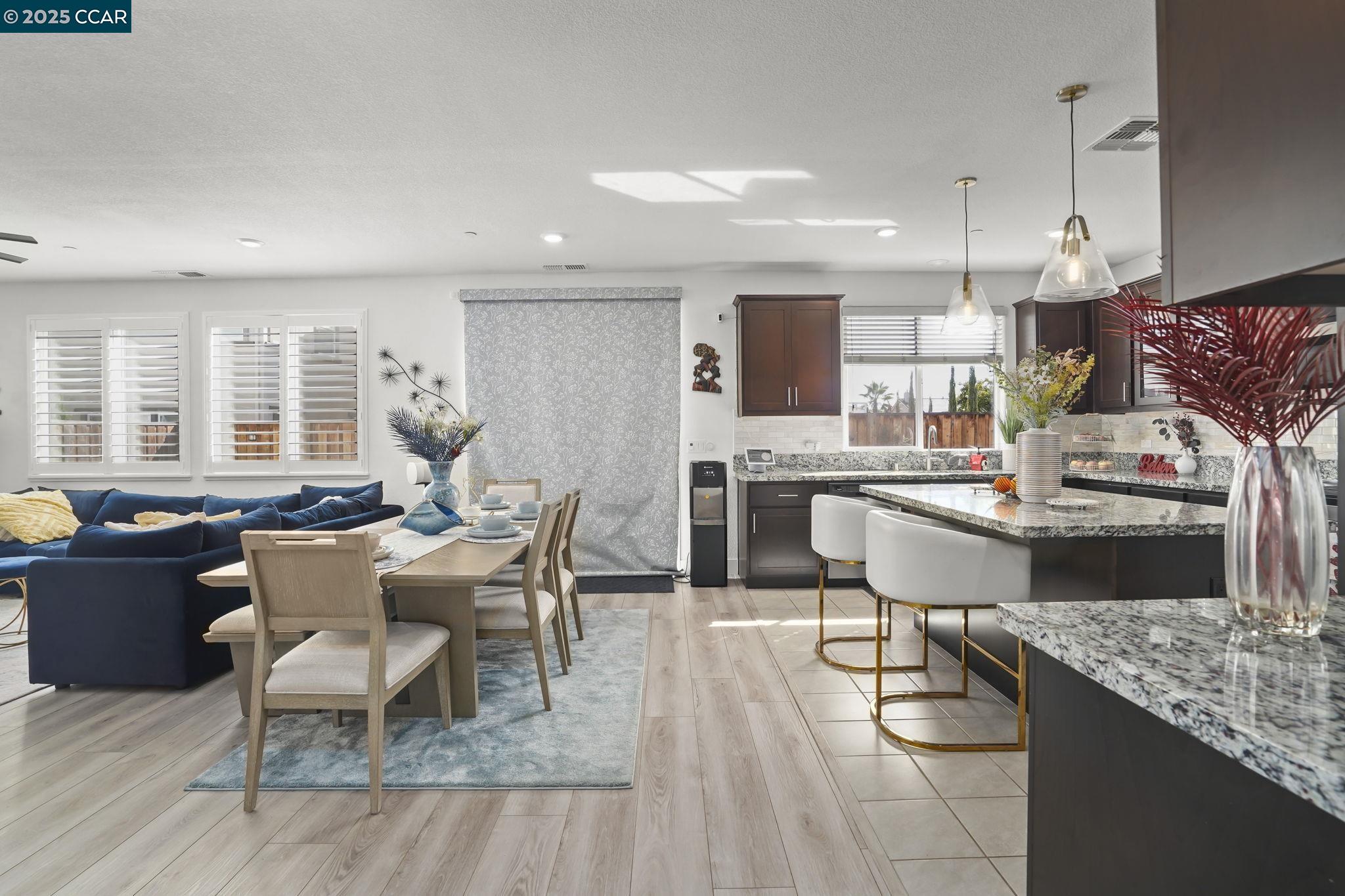433 Ramos Ranch Road Oakley, CA 94561 - Photo 8 of 25 a dining room with furniture and wooden floor