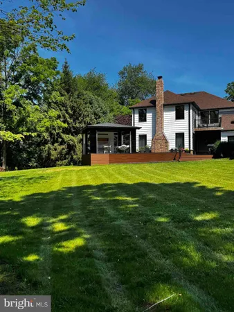 a view of a house with a big yard
